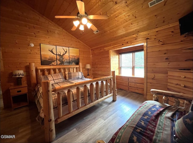311 Caney Creek Rd, Pigeon Forge, TN 37863 - bedroom featuring lofted ceiling, wooden walls, wood finished floors, and wooden ceiling