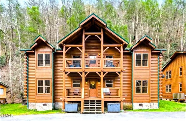 311 Caney Creek Rd, Pigeon Forge, TN 37863 - log cabin with a balcony, crawl space, and log siding