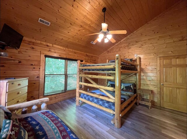 311 Caney Creek Rd, Pigeon Forge, TN 37863 - bedroom featuring lofted ceiling, wooden walls, wood finished floors, and wooden ceiling