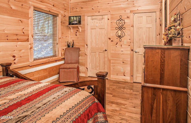 3510 Twin City Way, Pigeon Forge, TN 37863 - bedroom with wood walls and wood finished floors