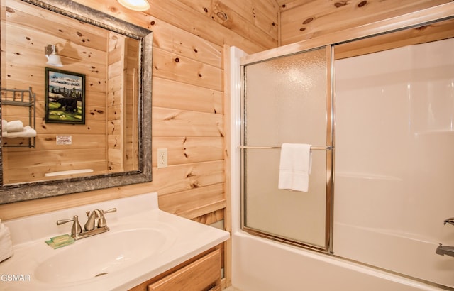 3510 Twin City Way, Pigeon Forge, TN 37863 - bathroom featuring bath / shower combo with glass door, vanity, and wooden walls