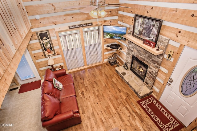 3510 Twin City Way, Pigeon Forge, TN 37863 - living room with wood finished floors, a ceiling fan, and a fireplace