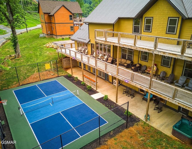 604 Cherokee Orchard Rd, Gatlinburg, TN 37738 - rear view of house featuring a tennis court and metal roof
