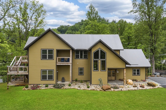 604 Cherokee Orchard Rd, Gatlinburg, TN 37738 - rear view of property with metal roof, a yard, and french doors