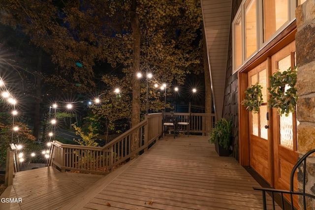 view of deck at twilight