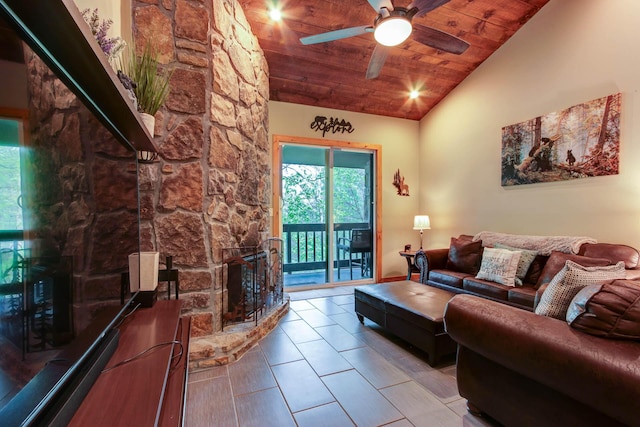 tiled living room with a fireplace, high vaulted ceiling, ceiling fan, and wood ceiling