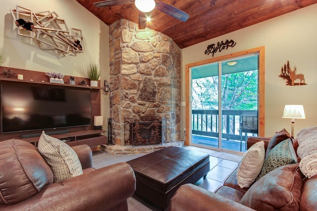 tiled living room featuring ceiling fan, a fireplace, wooden ceiling, and lofted ceiling