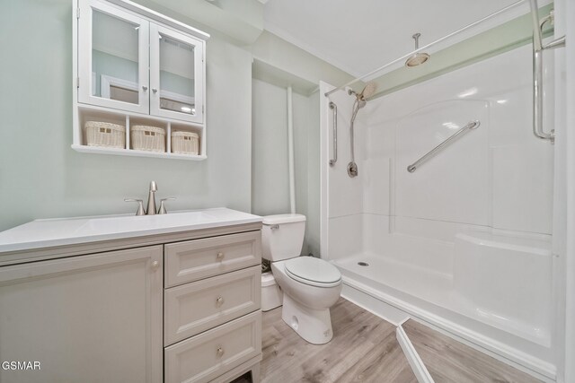 3206 Bativa Garden Ct, Sevierville, TN 37876 - full bathroom with toilet, a shower, wood finished floors, and vanity
