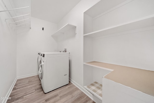 3206 Bativa Garden Ct, Sevierville, TN 37876 - laundry room featuring light wood finished floors, separate washer and dryer, and baseboards