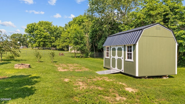 3206 Bativa Garden Ct, Sevierville, TN 37876 - view of yard with an outdoor fire pit and view of wooded area