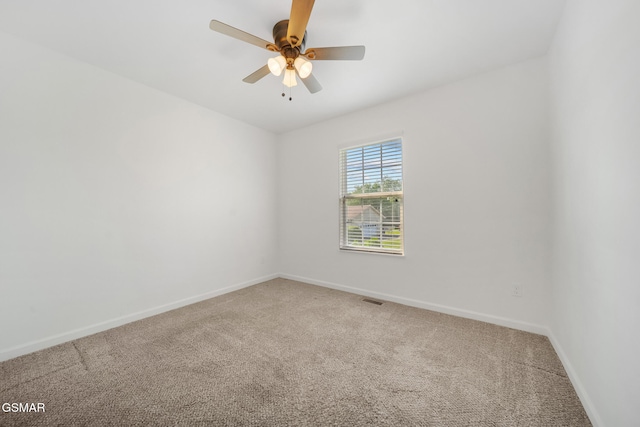 3206 Bativa Garden Ct, Sevierville, TN 37876 - empty room featuring light colored carpet, baseboards, and ceiling fan
