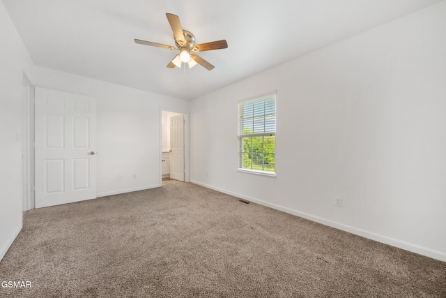 3206 Bativa Garden Ct, Sevierville, TN 37876 - unfurnished bedroom featuring carpet floors, baseboards, and ceiling fan