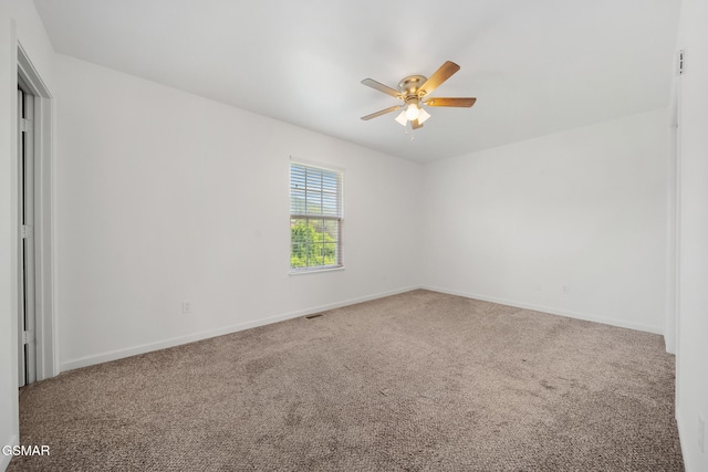 3206 Bativa Garden Ct, Sevierville, TN 37876 - empty room with a ceiling fan, carpet, and baseboards