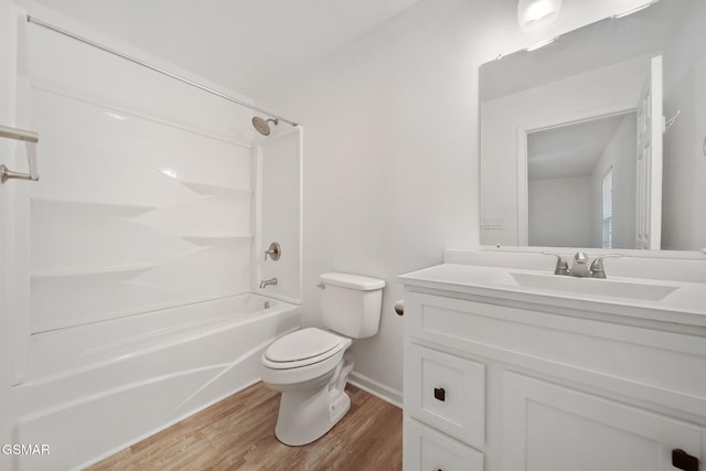 3206 Bativa Garden Ct, Sevierville, TN 37876 - bathroom featuring tub / shower combination, vanity, toilet, wood finished floors, and baseboards