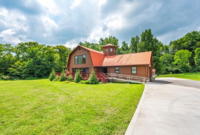 log home featuring a front lawn