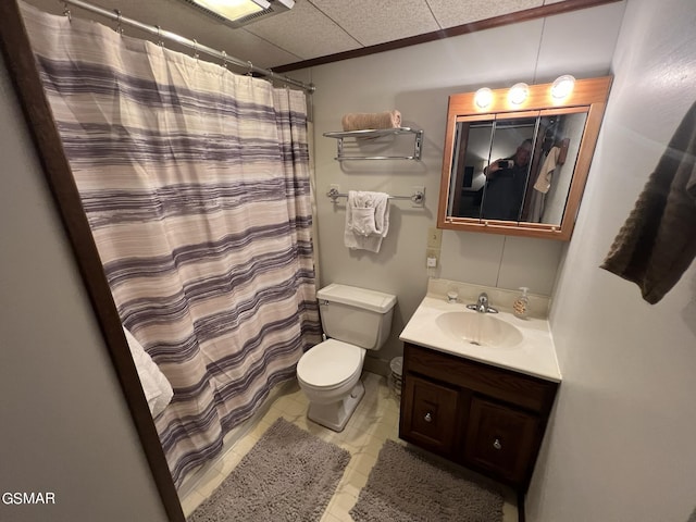 bathroom featuring a shower with curtain, vanity, a paneled ceiling, and toilet