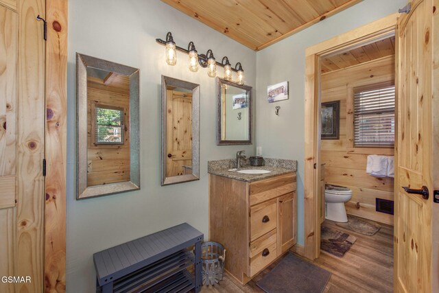 2319 Panther Way, Sevierville, TN 37876 - bathroom featuring vanity, wood finished floors, and wood ceiling