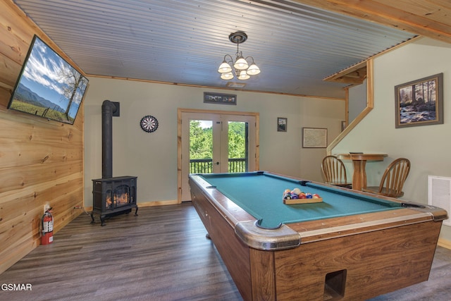 2319 Panther Way, Sevierville, TN 37876 - playroom with french doors, dark wood finished floors, a wood stove, and billiards table