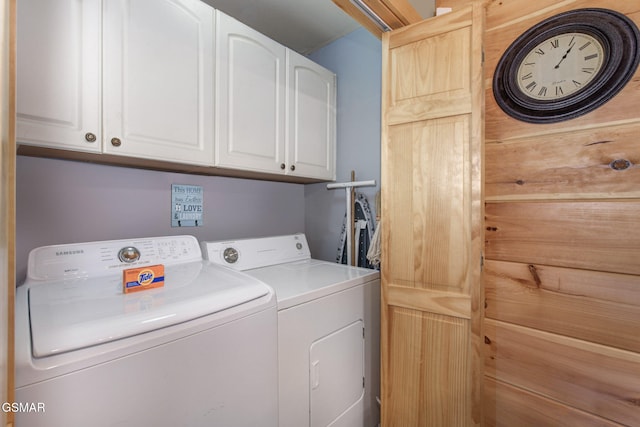 2319 Panther Way, Sevierville, TN 37876 - laundry area featuring washer and clothes dryer and cabinet space