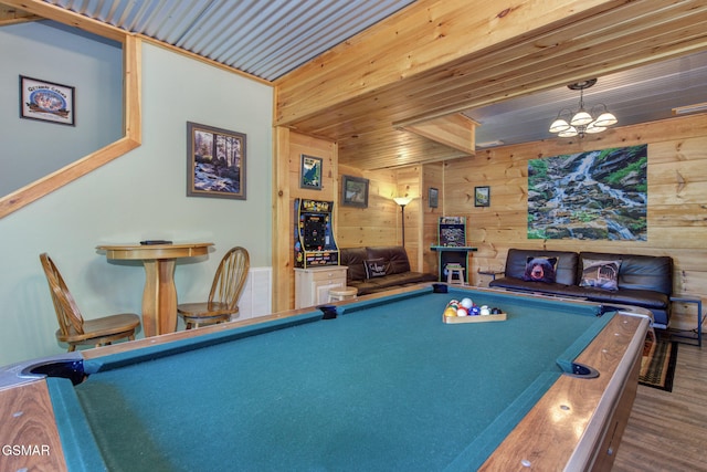2319 Panther Way, Sevierville, TN 37876 - recreation room with wooden walls, pool table, a chandelier, wood finished floors, and wood ceiling