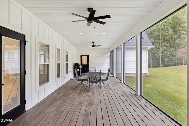 sunroom / solarium with ceiling fan