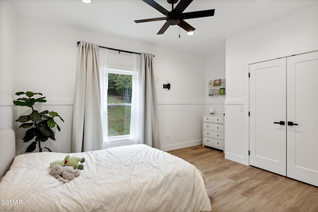 bedroom featuring light hardwood / wood-style flooring and ceiling fan