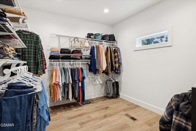 spacious closet with light wood-type flooring