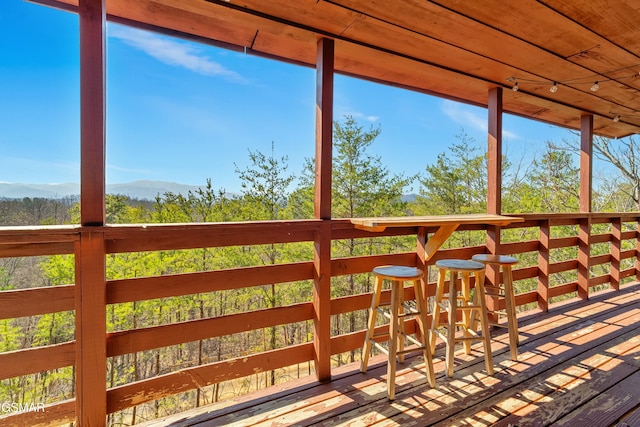 wooden terrace featuring a mountain view