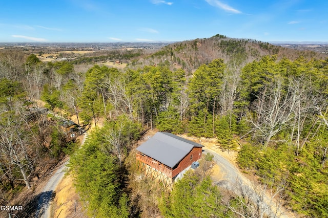 bird's eye view featuring a forest view