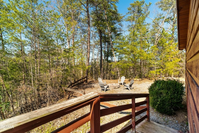 view of yard with a fire pit