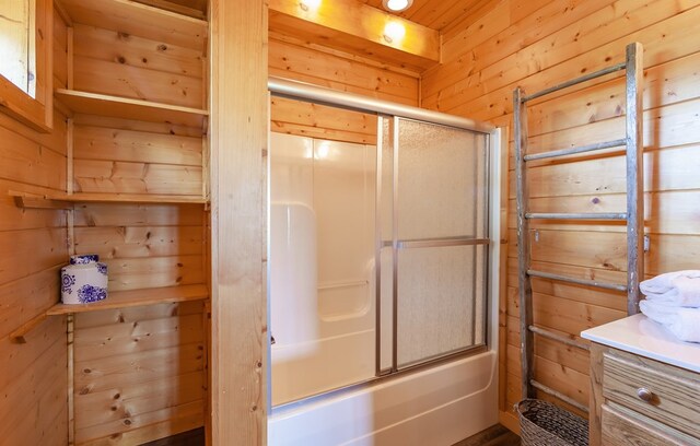 2837 Cedar Falls Way, Sevierville, TN 37862 - full bath with wood walls and bath / shower combo with glass door