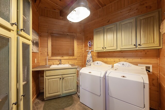 2837 Cedar Falls Way, Sevierville, TN 37862 - laundry area with cabinet space, wooden ceiling, independent washer and dryer, and wood walls