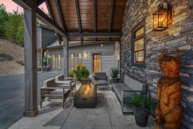 2837 Cedar Falls Way, Sevierville, TN 37862 - view of patio with an outdoor living space with a fire pit