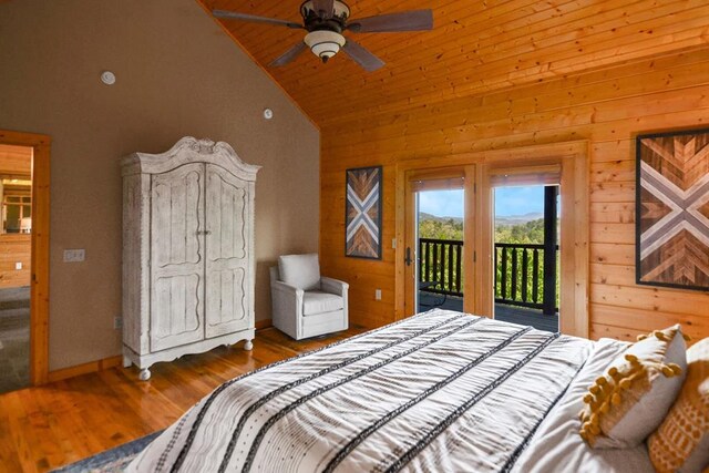 2837 Cedar Falls Way, Sevierville, TN 37862 - bedroom with access to exterior, wood walls, wood ceiling, wood finished floors, and high vaulted ceiling