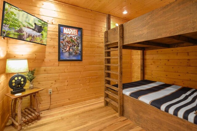 2837 Cedar Falls Way, Sevierville, TN 37862 - bedroom with wood walls, wood ceiling, and wood finished floors