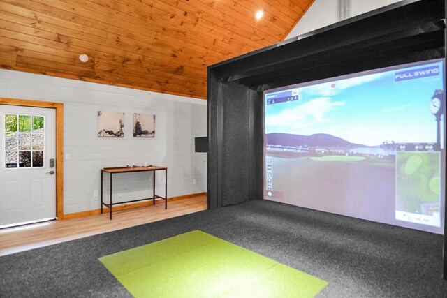 2837 Cedar Falls Way, Sevierville, TN 37862 - rec room with wooden walls, golf simulator, vaulted ceiling, wooden ceiling, and wood finished floors