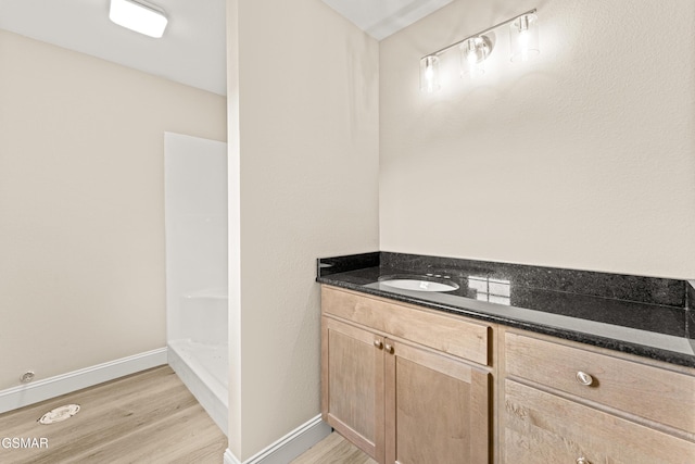1039 Cedar Ln, Sevierville, TN 37862 - full bathroom with wood finished floors and vanity