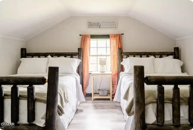 unfurnished bedroom featuring vaulted ceiling