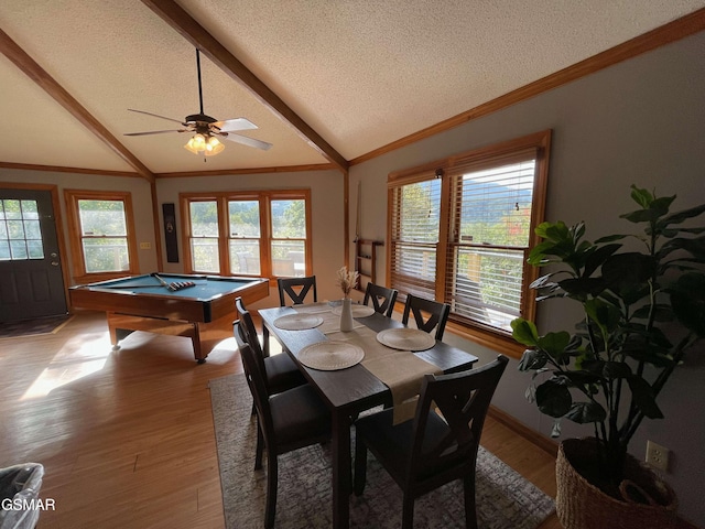 dining space with lofted ceiling with beams, pool table, and light wood-type flooring