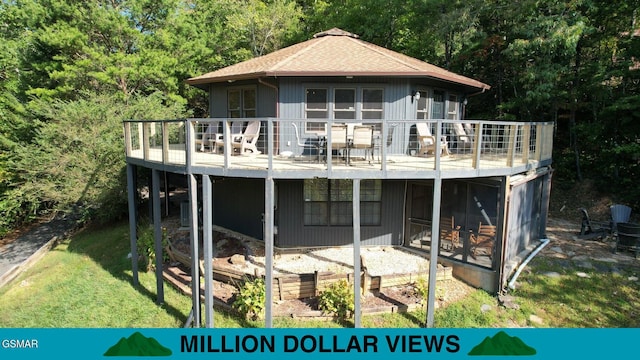 3709 Eagle Ln, Gatlinburg, TN 37738 - back of house with a shingled roof, a deck, and a lawn
