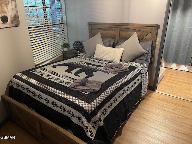 bedroom featuring light hardwood / wood-style flooring