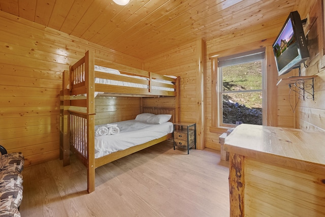 2857 White Oak Ridge Ln, Sevierville, TN 37862 - bedroom with wooden walls, wood ceiling, and wood finished floors