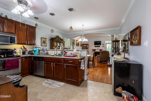 3518 Pebblebrook Way, Knoxville, TN 37921 - kitchen featuring crown molding, a peninsula, a sink, appliances with stainless steel finishes, and light tile patterned floors