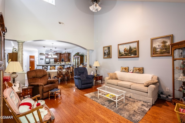 3518 Pebblebrook Way, Knoxville, TN 37921 - living room with ornate columns, a ceiling fan, a high ceiling, and arched walkways