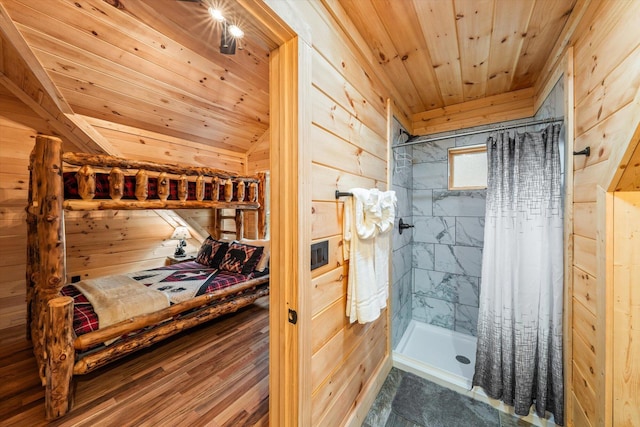 bathroom featuring wood ceiling, curtained shower, vaulted ceiling, and wood walls