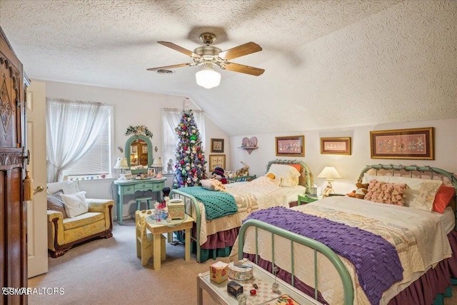 carpeted bedroom with ceiling fan, lofted ceiling, and a textured ceiling