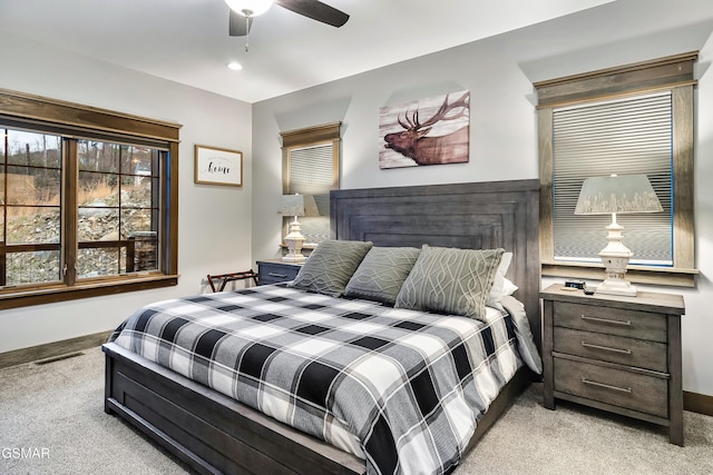 710 Wiley Oakley Dr, Gatlinburg, TN 37738 - bedroom featuring light colored carpet, baseboards, and a ceiling fan