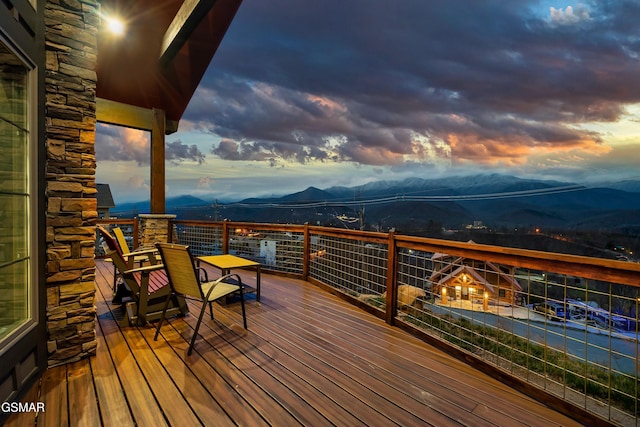 710 Wiley Oakley Dr, Gatlinburg, TN 37738 - deck at dusk featuring a mountain view