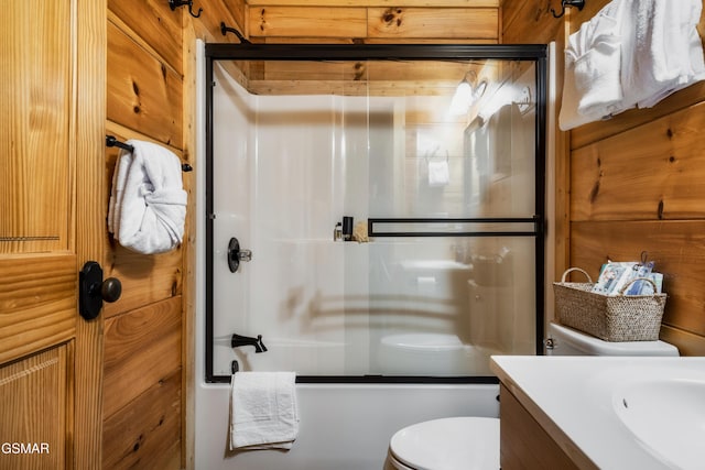 2017 Smoky Cove Rd, Sevierville, TN 37876 - bathroom featuring shower / bath combination with glass door, toilet, and vanity