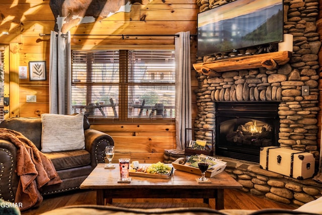 2017 Smoky Cove Rd, Sevierville, TN 37876 - living area with a stone fireplace and wood finished floors